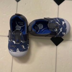 Stride rite soft motion slip on shoes. Navy with sharks. Never worn outside.